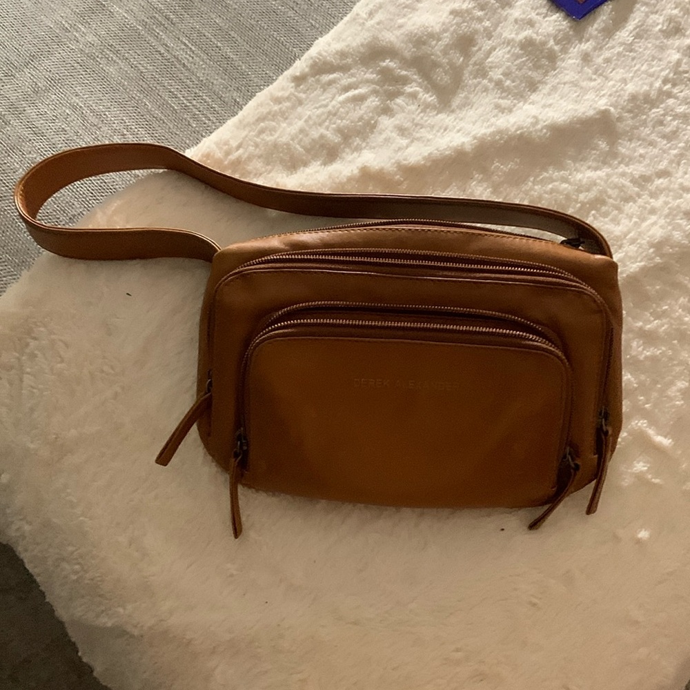 I have a small Derek Alexander organizer purse with a 10 inch strap.
